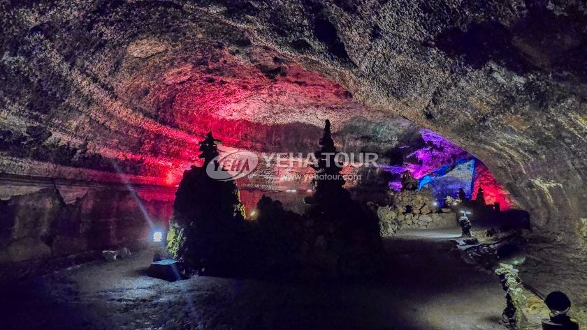 Lava cave lit with colored lights