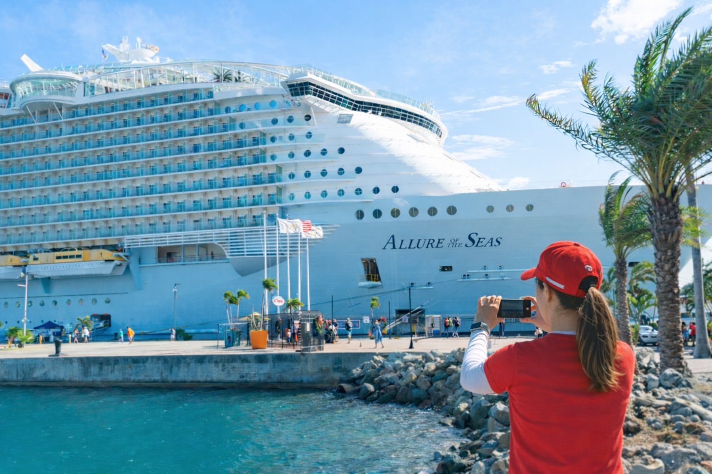Traveler photographing her cruise ship at the port