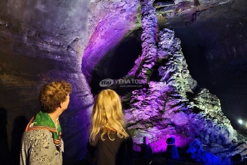 Lava cave lit with colored lights